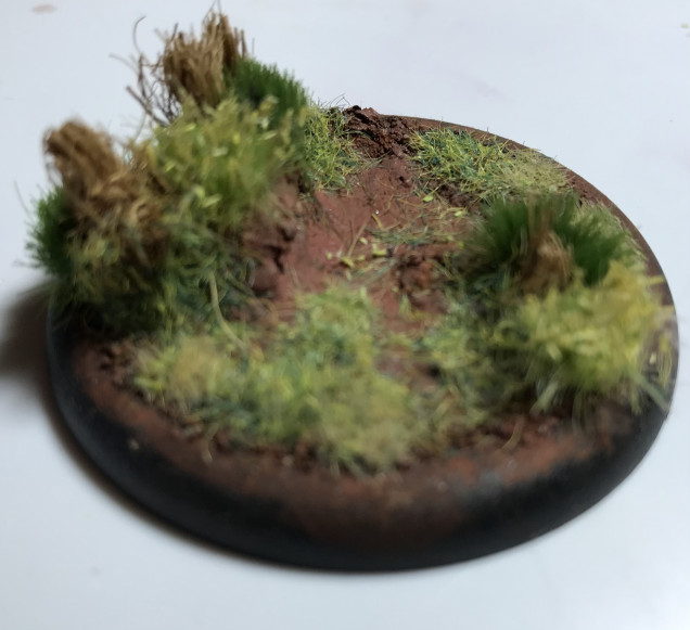 Im going to start by making a scenic base for the sniper team. The long elephant grass is made from an old door mat thats slowely being chopped up.