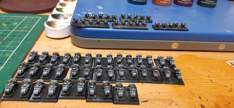 dark angels green on arms, snakebite leather on boots and gloves