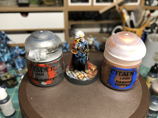 All brass parts were highlighted with GW Hashut Copper. The pistol barrel and firing mechanism were slightly brushed with GW Leadbelcher. Note that if you are so inclined (I was) you can add patterns to the jacket and pants using a very fine brush and a lighter shade of blue.