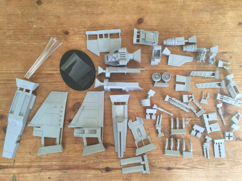 All parts appear present and accounted for and include a couple of options regarding the pilot and a clear piece of thin plastic to craft into windows for the cockpit canopy.