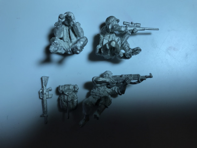 The next models in my painting pile of shame are a US Marine sniper team and a VC Sniper perfect for adding to a spider hole or other suitable covered onservation spot.