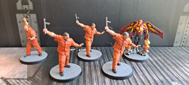 Prisoners on the run with Firefly.  Happy with how the prisoners turned out, Blazing Orange base and then a dryrbush of Kahdor Red Highlight, with increasing yellow in it.  I'm not so happy with Firefly but have too many figures to do at the moment.