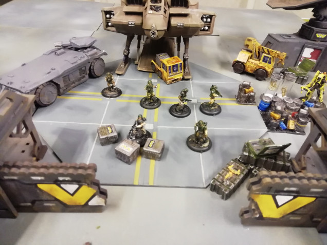 Trying out board game pieces on a wargame table