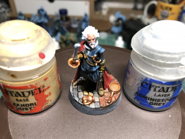 Wood floor (and bandolier/harness) were highlighted with GW Zandri Dust and stones were edge highlighted using GW Administratum Grey, to provide more dimensional contrast. 