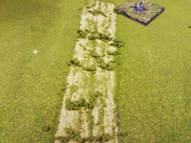 I have an old woodlands scenery mat that gets little use so I'm scraping away the roads leading to Waterloo