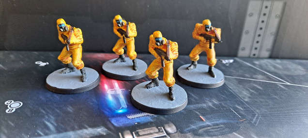 Hazmat suit thugs from Scarecrow's gang.  I've used the Contrast Yellow, but the orange colour in the shadows is very different from the the yellow, wish it worked better.