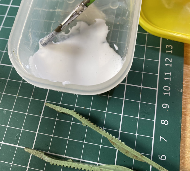 PVA and handy large plastic tweezers for applying static grass and tufts.