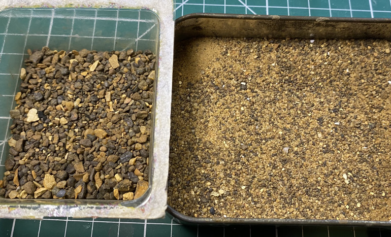 The sieved sharp sand; big bits and fine sand.