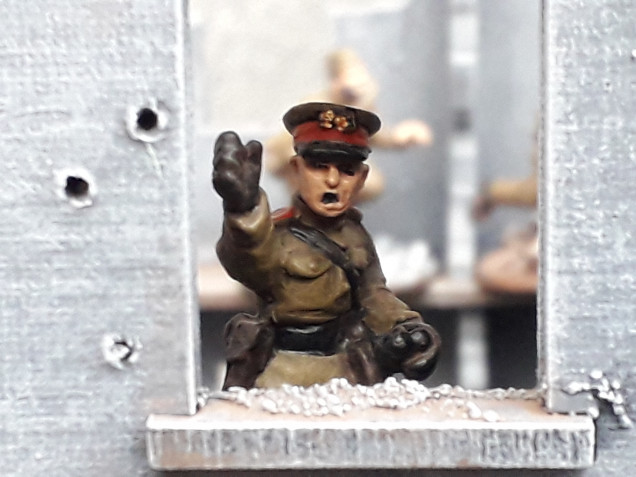 'Some are more equal than others!'. To make sure that all goes to plan, I have painted up an artillery man as an officer to direct the Strafbat platoon troops to Victory, naturally from a .safe distance. 