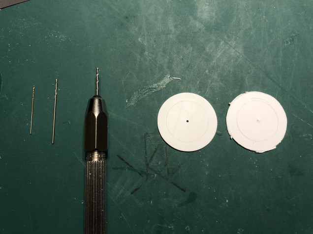 I then sanded each disc round and drilled out the centre hole progressively from 0.5mm to 1mm diameter.