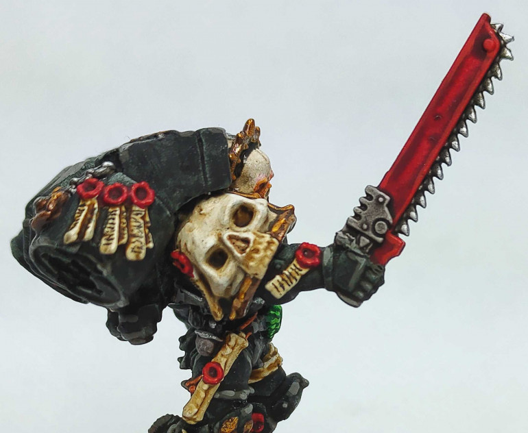 And the converted chainsword arm.