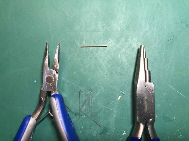 Using the wife's jewellery pliers to get the right curved bends