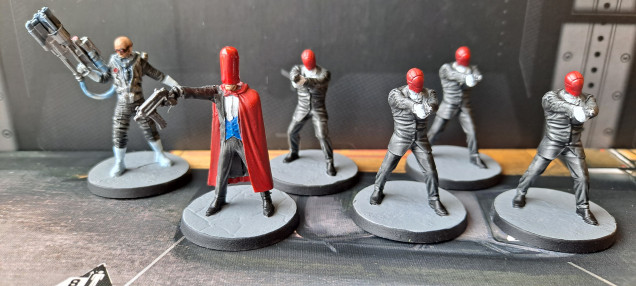 Red Hood and his gang, along with Mr Freeze.  I have used a gloss varnish on Red Hood's hood to try and make it a little more shiny.