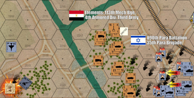 Damon is losing the game, and realizes he’s out of time.  He’s shot the ever-living hell out of my infantry battalion that’s taken the Port Suez Road objective, and now masses his remaining paratroopers, their halftracks, 10 Sho’t Centurions (two counters) and even the battalion commander’s M-113 sections in a do-or-die counterassault on the Port Suez Road.  It works, my entire contingent of the 113th Mechanzied Brigade is more or less shattered in a horrific slaughter.  Damon and I really tore each other apart down here, we count up later that no less than twenty-one PLATOONS have been destroyed here.  That’s twenty-one Bolt Action “ARMIES” shot up to the point of combat ineffectiveness.  That about 130 dead and somewhere around 400 wounded to one degree or another, along with 30 armored vehicles destroyed.   But he retakes the hex.  Damon also bits the bullet and calls in his air strikes directly against my SAMs (never having taken any of them out on the ground).  He dodges a bullet here, I don’t shoot down any A-4 Skyhawks, only forcing one to abort.  The other three strikes go in, and two of them hit.  That’s two of my three SA-2 sites blown off the map.  I’ve also sent on five T-55s (one counter) over the canal to try and take a poke at the Test Road objective hex, held by Damon’s recon jeeps and one platoon of paratroopers – but nothing comes of it.