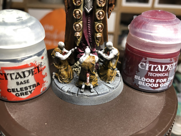 Minions skin was highlighted with GW Celestia Grey, using a small pointed brush and GW Blood for the Blood God was added around the sword wounds front and back.