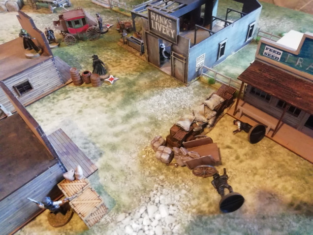 As the outlaws nice in our line lawman runs out to tackle a tough in melee. In the confusion the tough is gunned down by his own leader who has no problems shooting into a melee. This leaves our lawman open to be peppered with shots from the rest of the criminals
