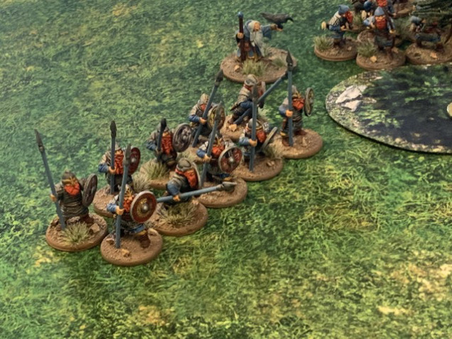 A ten dwarf warrior unit backed up by the wizard and next to a unit of archers. 