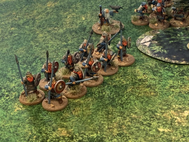 A ten dwarf warrior unit backed up by the wizard and next to a unit of archers. 