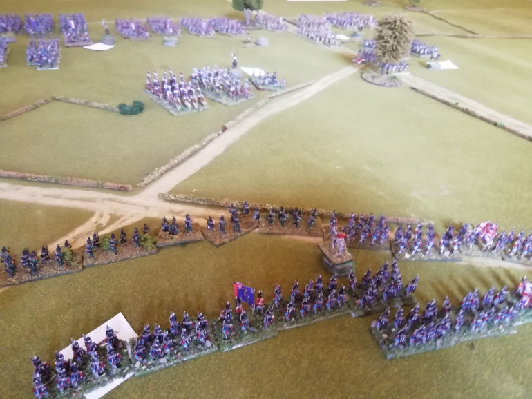 Redcoats and rifleman defend the hedgerow as the vanguard approaches