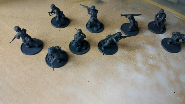These are then undercoated in 50/50 mix of grey and black Vallejo Surface Primer.  