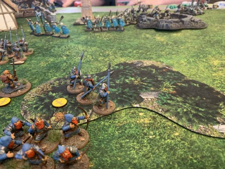 That enemy Hearthguard unit eventually reached my Warriors on the right flank and mauled them then went after the archers. Here my wizard does his shenanigans and temporarily removes the forest giving my archers a few shots on an approaching enemy unit. The Lieutenant also takes a few pot shots. 