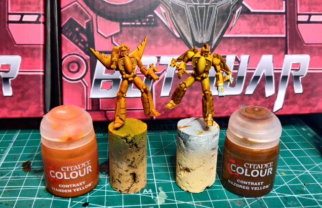 Moray, with Iyanden Yellow from an airbrush on the left, Stingray with Nazdreg yellow using a brush on the right