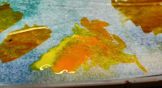 Mixing orange ink into the transparent yellow increases opacity and warmth