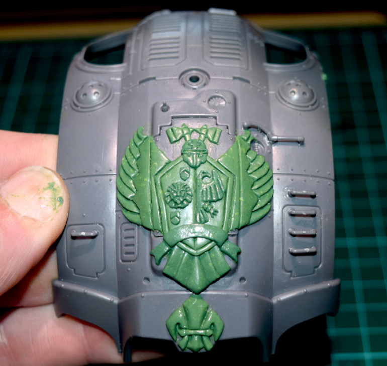 Adding the Household crest to the carapace armour...