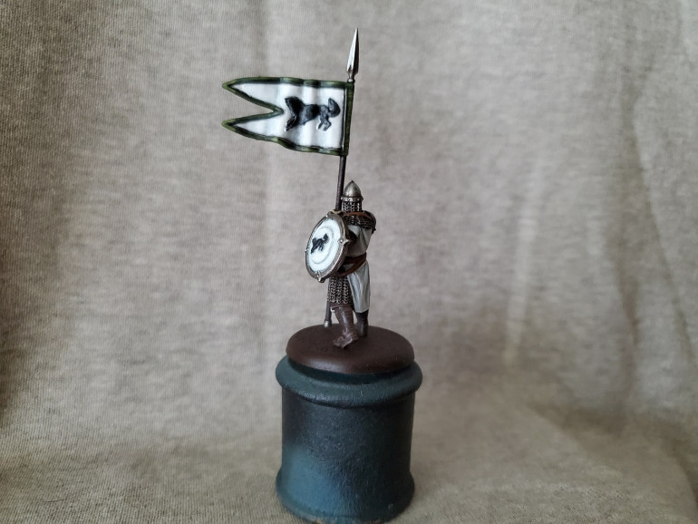 Seeing as he's carrying the banner I wanted to have a fully painted shield. Pretty pleased with how it turned out. I might change the wolves to look a little more grey than black eventually; the black is just a monochrome for the icon.