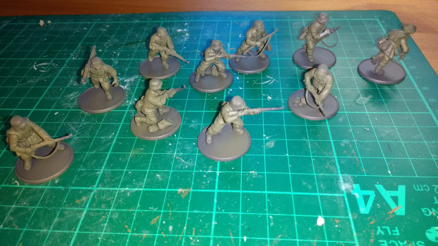 Next the miniatures are given a base coat of Vallejo German Field Grey, thinned with Vallejo Airbrush Thinner.