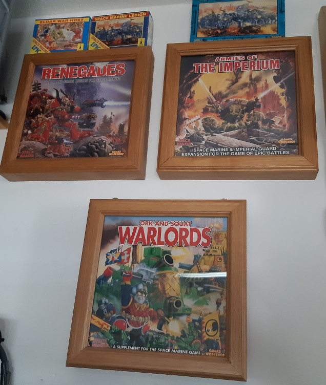 Wall art just missing the hive wars. Home made frames for boxes.