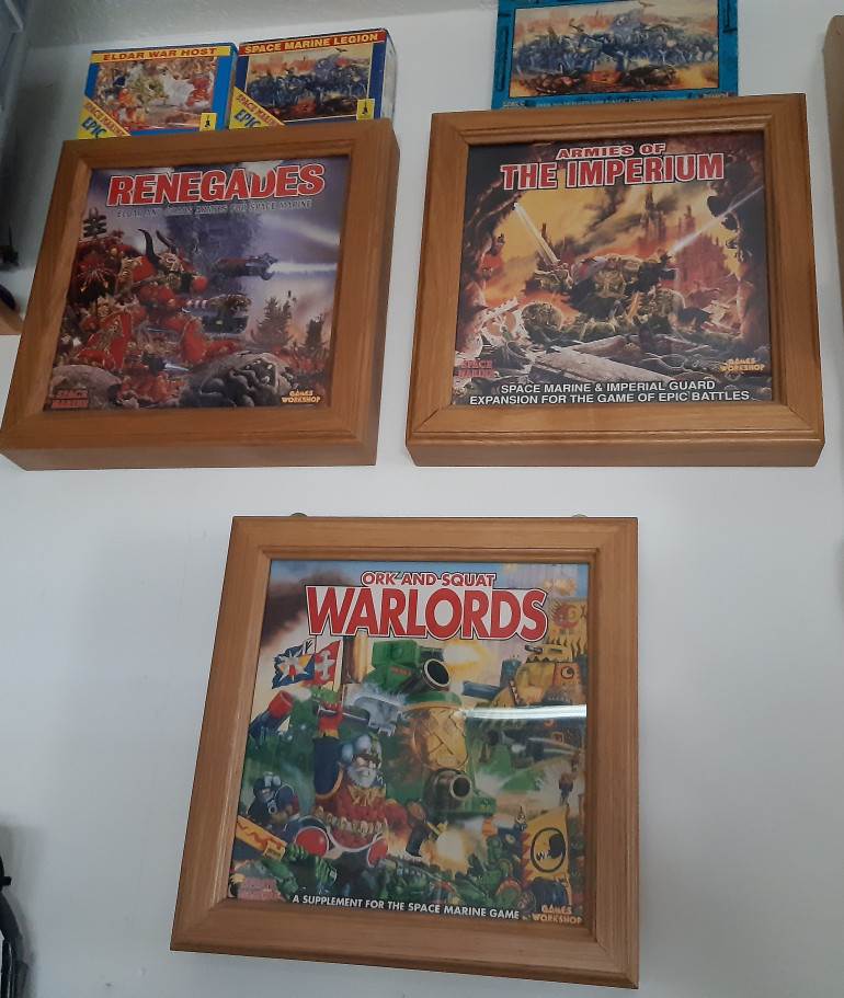 Wall art just missing the hive wars. Home made frames for boxes.