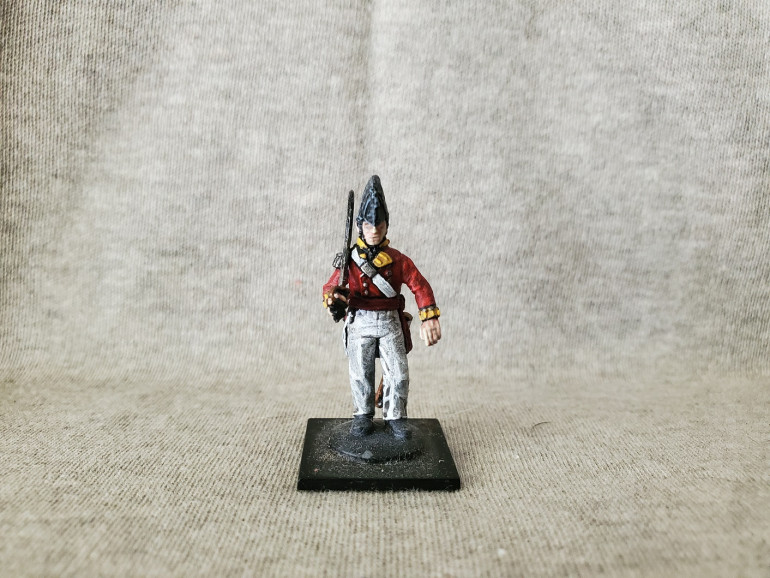He's one of the plastic Perrys that I originally painted up as a company officer (he only has one epaulette) of the 57th Foot. I painted him several years ago now, so it's also a nice opportunity to see how much better my painting has gotten since then...I hope. 