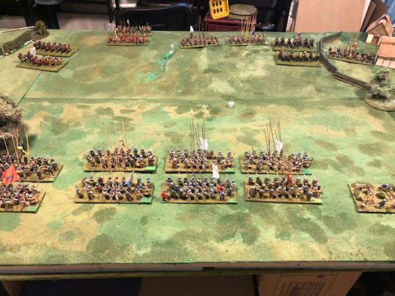 English centre stand their ground, cavalry advance. Scots advance across the line