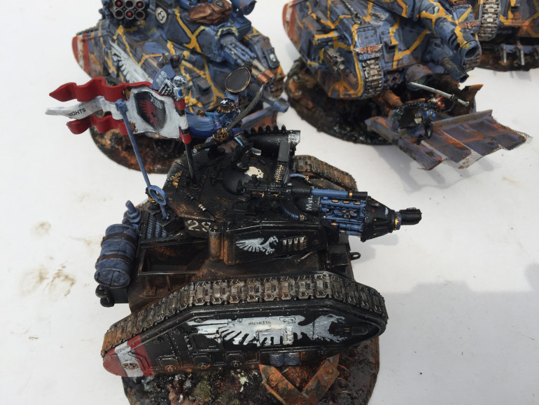 In the cold wet of a nearing Winter, Commander Glofski found herself in charge of a bunch of misfits and battle-scarred veterans having been promoted by an ever watchful Commissar. All these tanks were repair jobs and repainted to make a unified five (wo)man tank unit. 