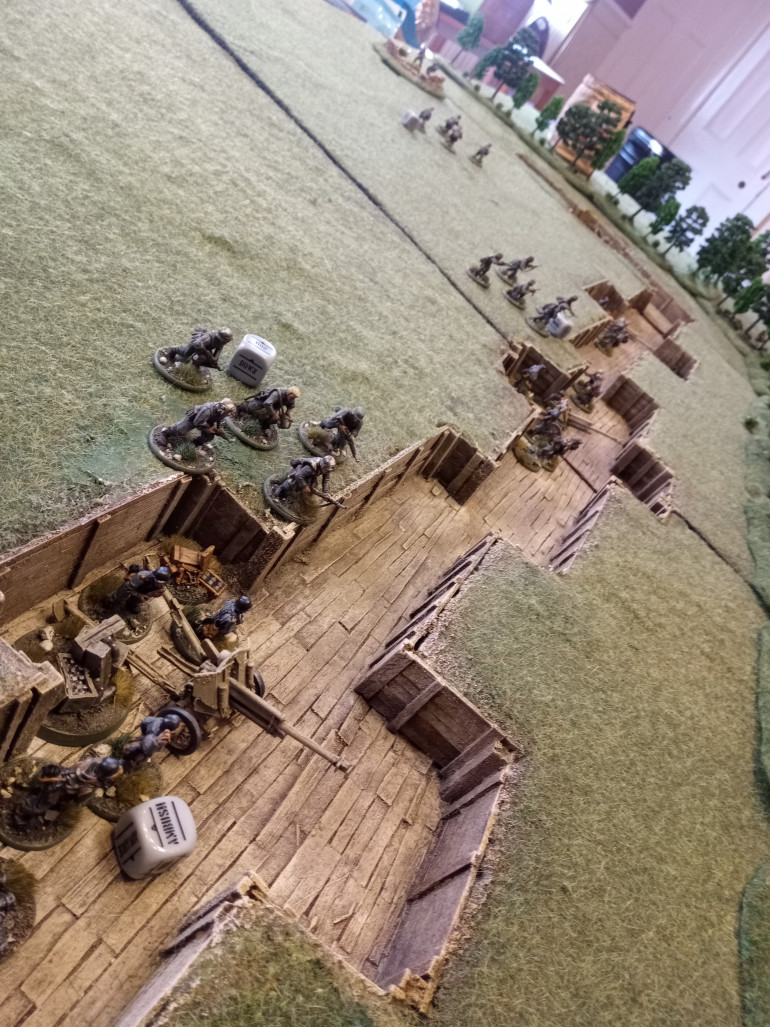 Along the trench line the Germans advance to defend against the sudden hail of fire