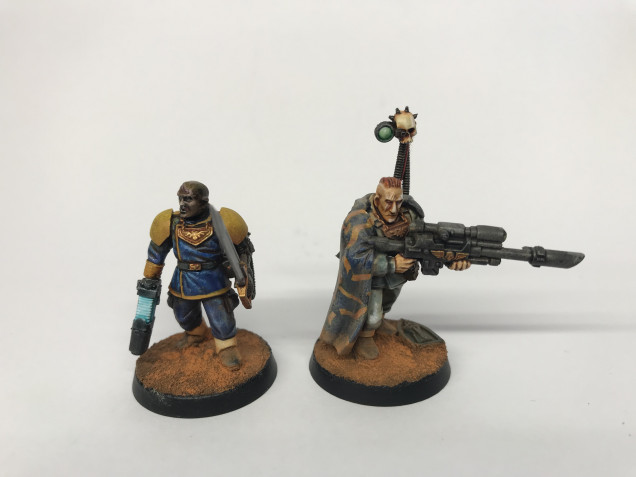 A naval attache and Militarum marksman on secondment to the Inquisition.