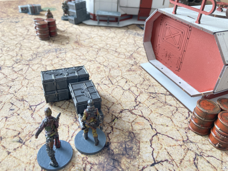 On the left side both Hobbs and Treva got into cover among some crates and let off shots gunning down an enemy. The specialist seeing his friend shot lost his nerve and ran for it.