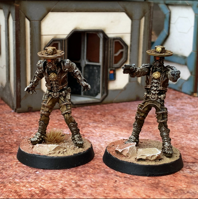 Patrol Bots Jeff and Jim. Humanoid in form but larger and highly dangerous.  Wild West Exodus lawbots for the models.