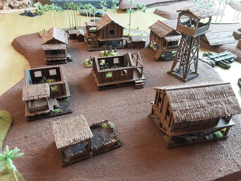 The sharp eye will notice some other 15mm huts from flashpoint miniatures between. The scale creep is quite noticable. 