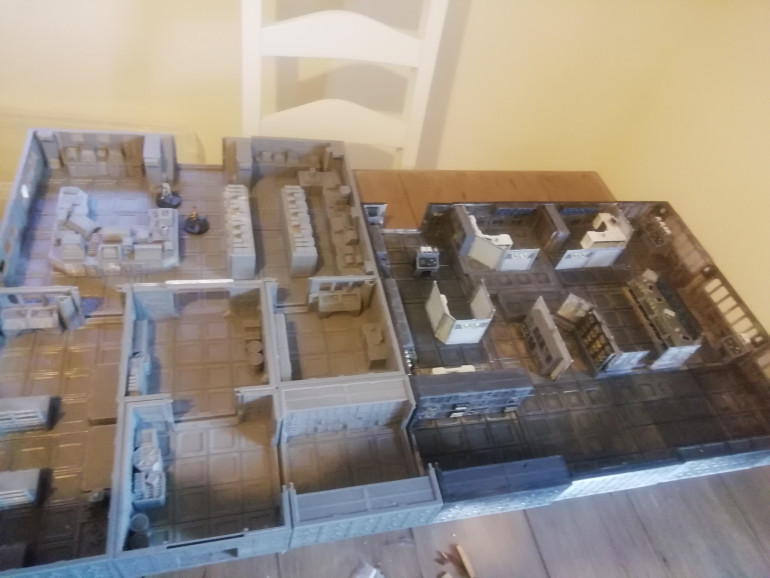 Placed next to the operations I now have a large playing area. It's the same size as the operations but turned. Because it's made from squares it was hard for the kit to fit everything in. The blueprints from the film show that the two areas are a little more flush with each other.