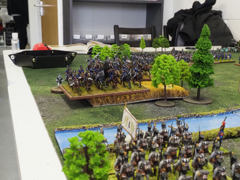 The French/Austrians advance to meet the Prussian Cavalry at the river