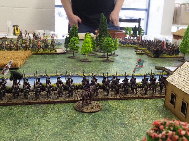 The Prussian Infantry form a line on the riverbank to hold off the french cavalry