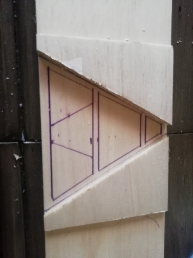 I sketched out my design on the wood using my 3D printed blocks to measure out the five spaces