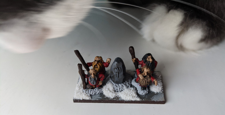 Druids summoning a spirit cat to do their bidding