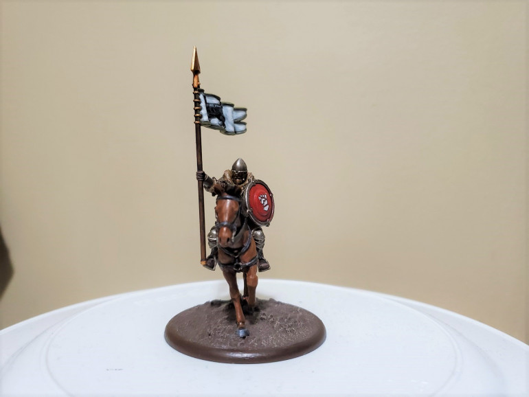 Beyond the heraldic colours, I tried to keep things a little more dour for the Northmen without resorting to blacks and browns on everything. While there are knights in the North, they are not that big on the whole idea, and even when they do get knighted they are usually not as affluent as the Southerners.