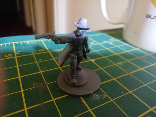 While at salute I picked up the plastic kit for dead man's hand. I'm using it to create some Texas Rangers and a couple if hired characters for legends. I also got the science experiment miniature just to have as a bit of odd scenery in the blacksmiths shop