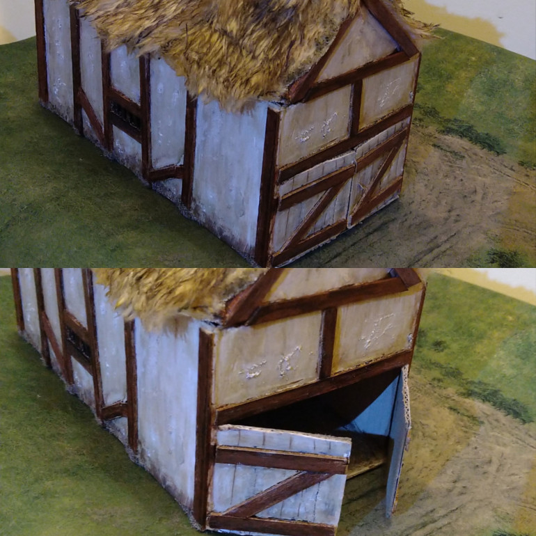 Using the same box type I made a barn. I cut two horizontal lines across one end (half way up and bottom) and then bisected that vertically to join the two lines, thus make opening and closing barn doors