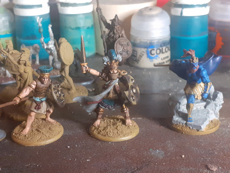 From left to right, two Lucid Eye models that I am using as my character figures in my current game of Runequest. A Lion Tower model whose spear has been replaced with a sword to represent Orlanth in his human form, based on the image from the Runequest cover. Behind him is a Lucid Eye Centaur.
