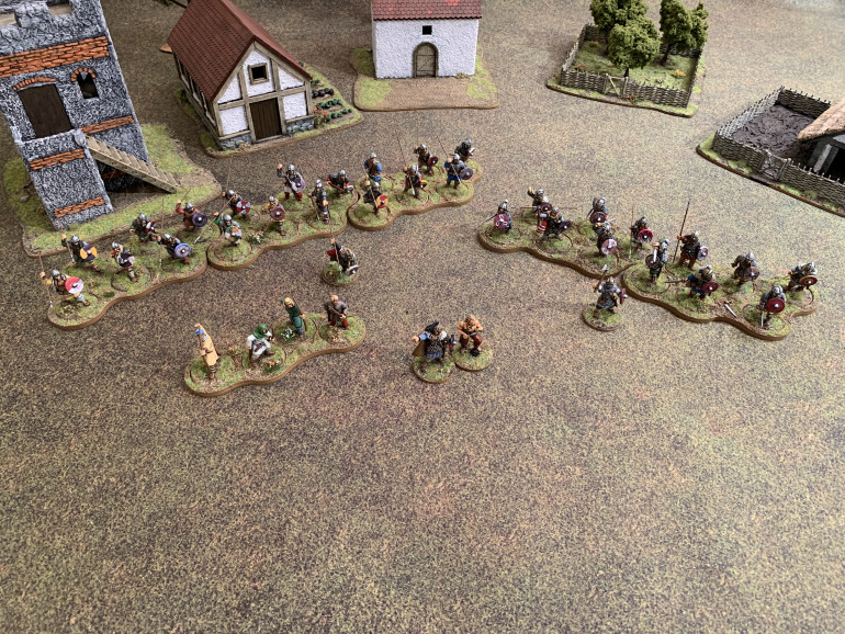 The completed warband. Warlord and Champion at the front with archers to the left. Behind you have two groups of Hearthguard to the right and three groups of Warriors to the left, each led by a Noble.